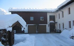 Appartement im Souterrain mit Terrasse